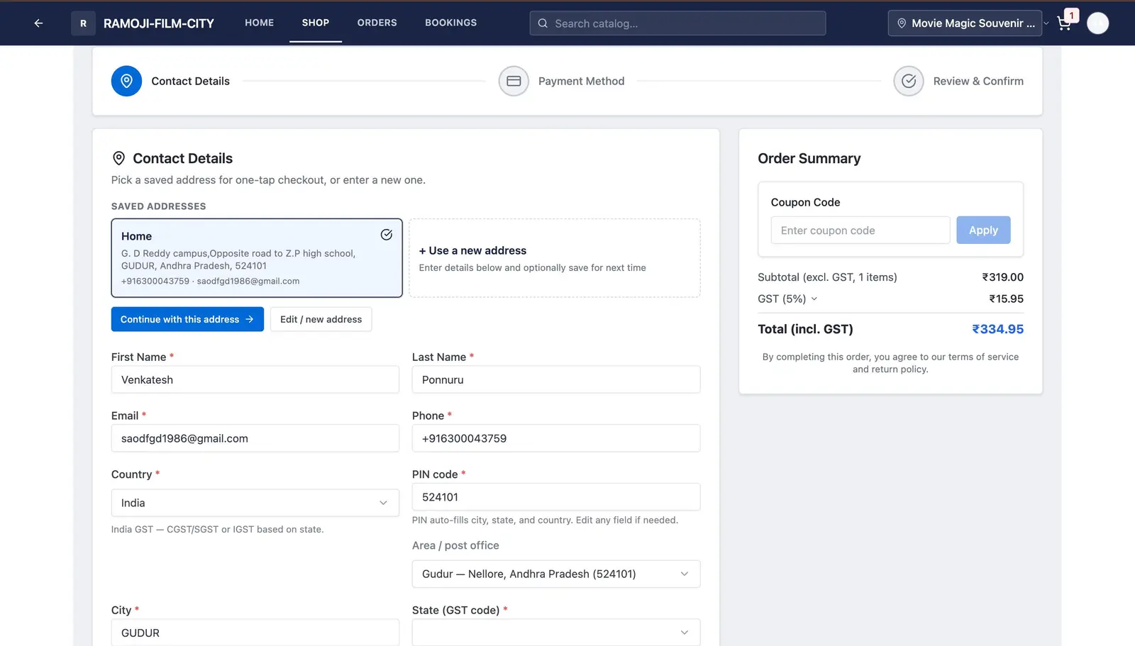 A customer checkout screen with saved address and GST breakdown