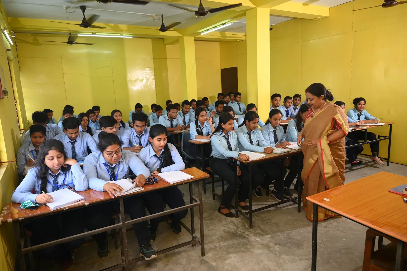 Students and staff on a school campus during the day